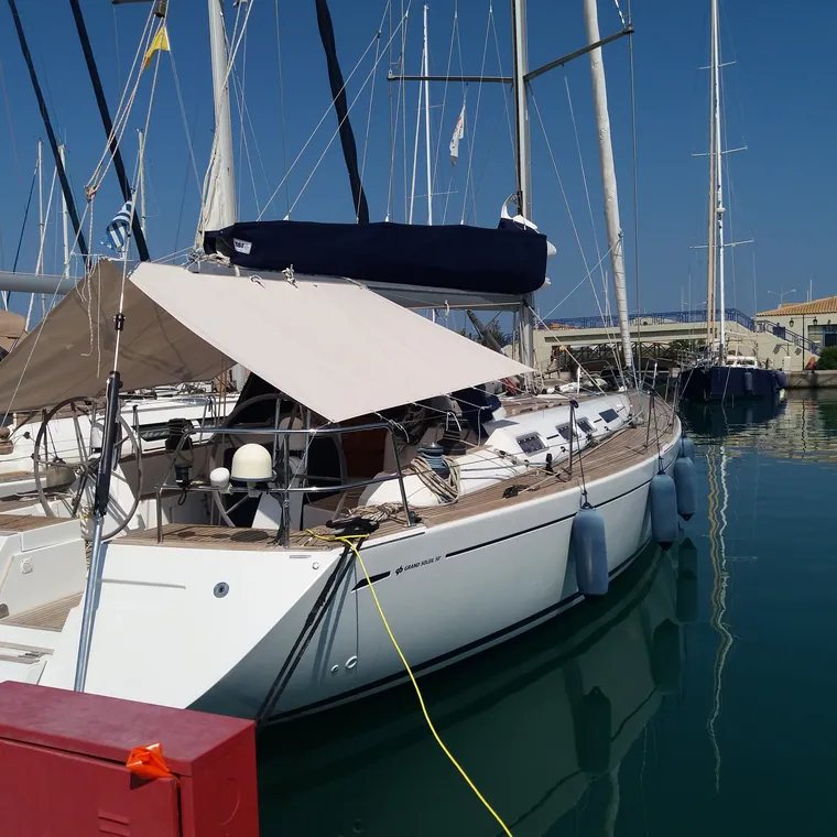 Sun awning over the aft deck of a yacht lying in the harbour