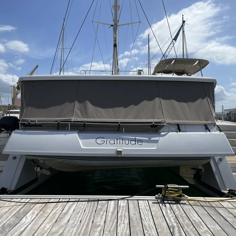 Full cockpit enclosure on a catamaran at the quay