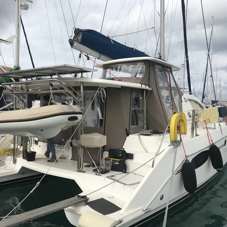 Enclosure and bimini on a catamaran at her mooring