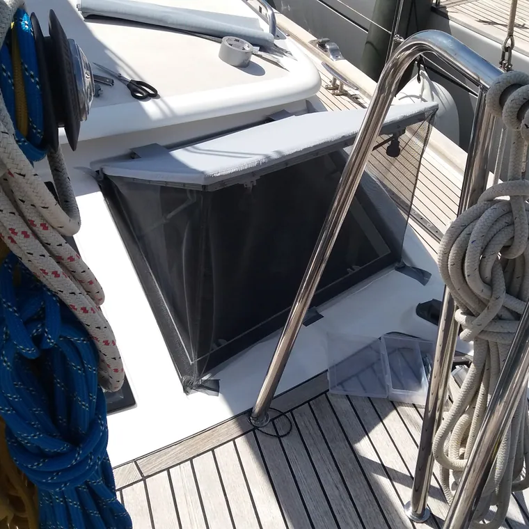 Covers over the winches and instruments on the side deck of a yacht