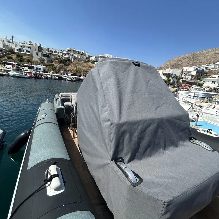Grey cover over a tender's console at the quay
