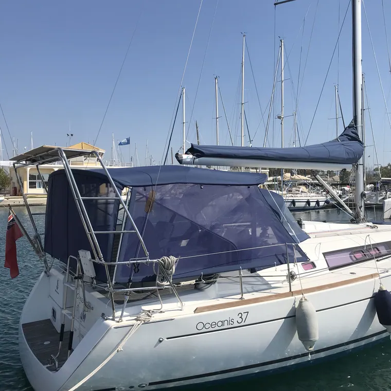Navy lazy bag and bimini on a cruising yacht in the marina