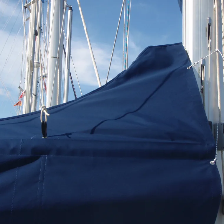 Blue lazy bag closed over the mainsail