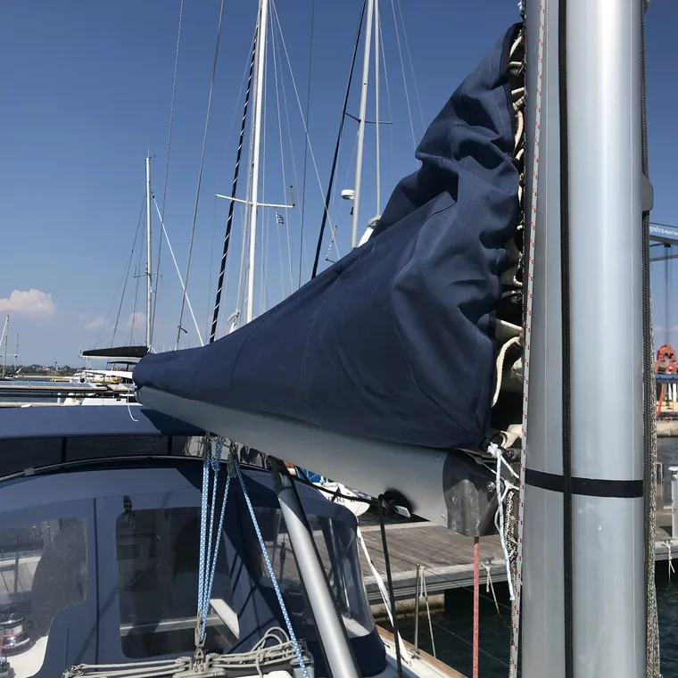 Navy lazy bag at the mast of a yacht in the marina