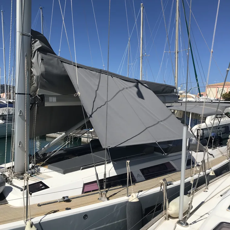 Grey lazy bag seen from the foredeck against the sky