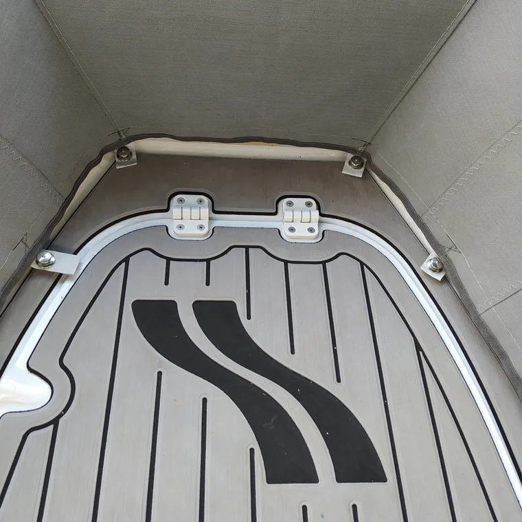 Synthetic teak decking laid inside a RIB