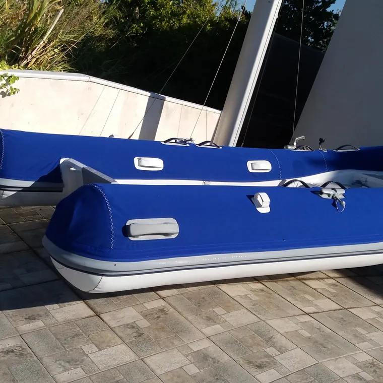 Blue tubes on a RIB finished and laid out in the yard