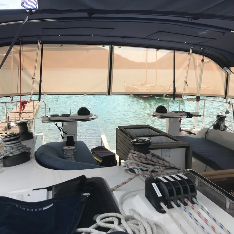 Clear side panels closed around a yacht's cockpit