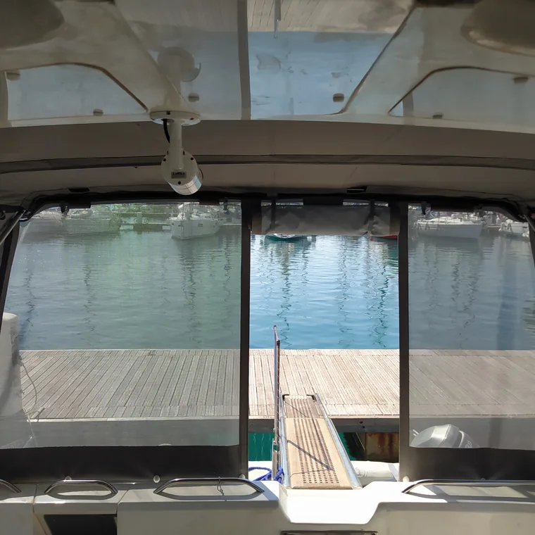 Looking out through the clear panels of a cockpit enclosure
