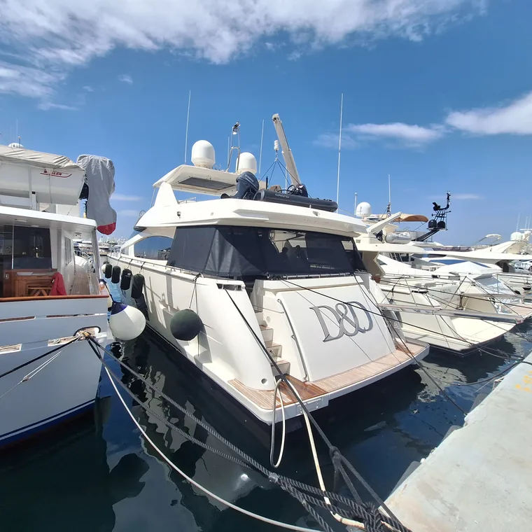Side panels fitted on a motor yacht in the marina