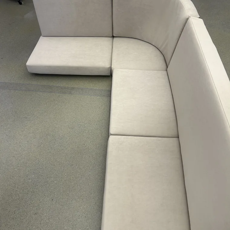 Cream L-shaped cushion set finished in the workshop