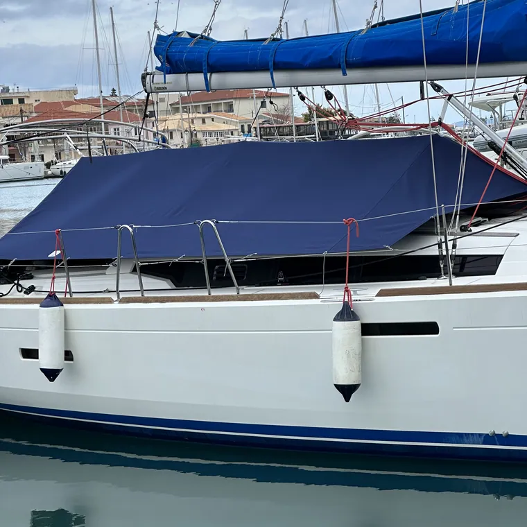 Navy winter cover on a yacht berthed in a marina
