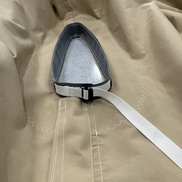 Winter cover cut around a stainless deck fitting