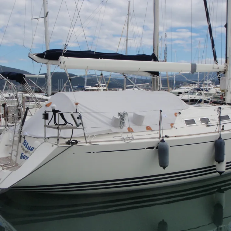 Winter covers along a row of yachts in the marina