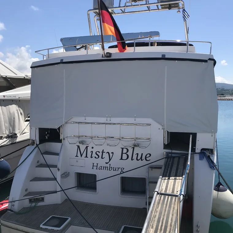 Fitted winter cover over the aft deck of a motor yacht