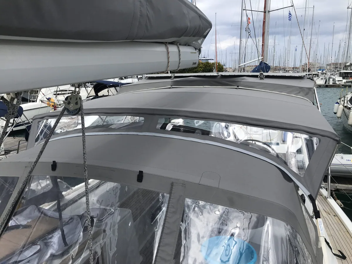 Clear panels zipped into a grey enclosure over the cockpit