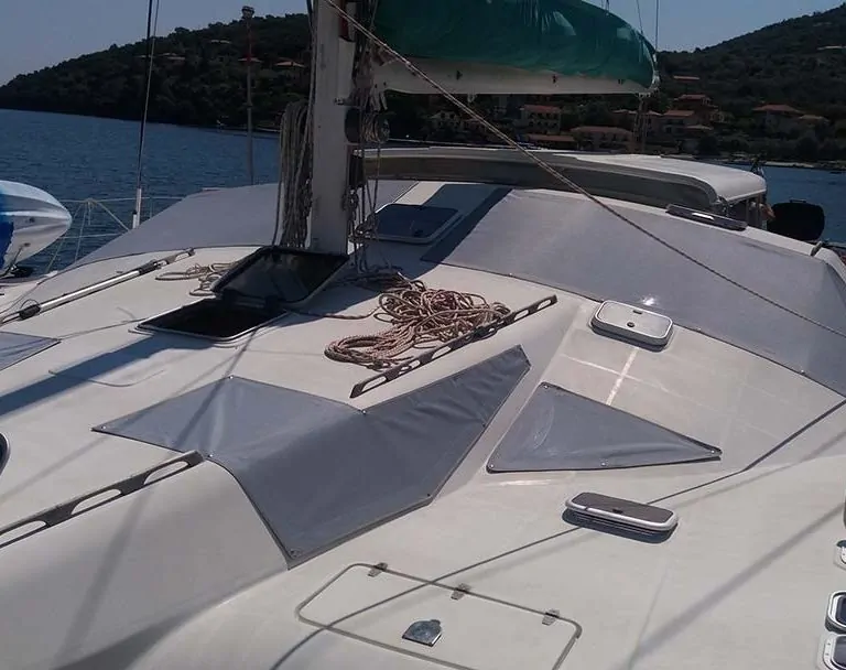 Worn seam and zip on a boat cover being repaired